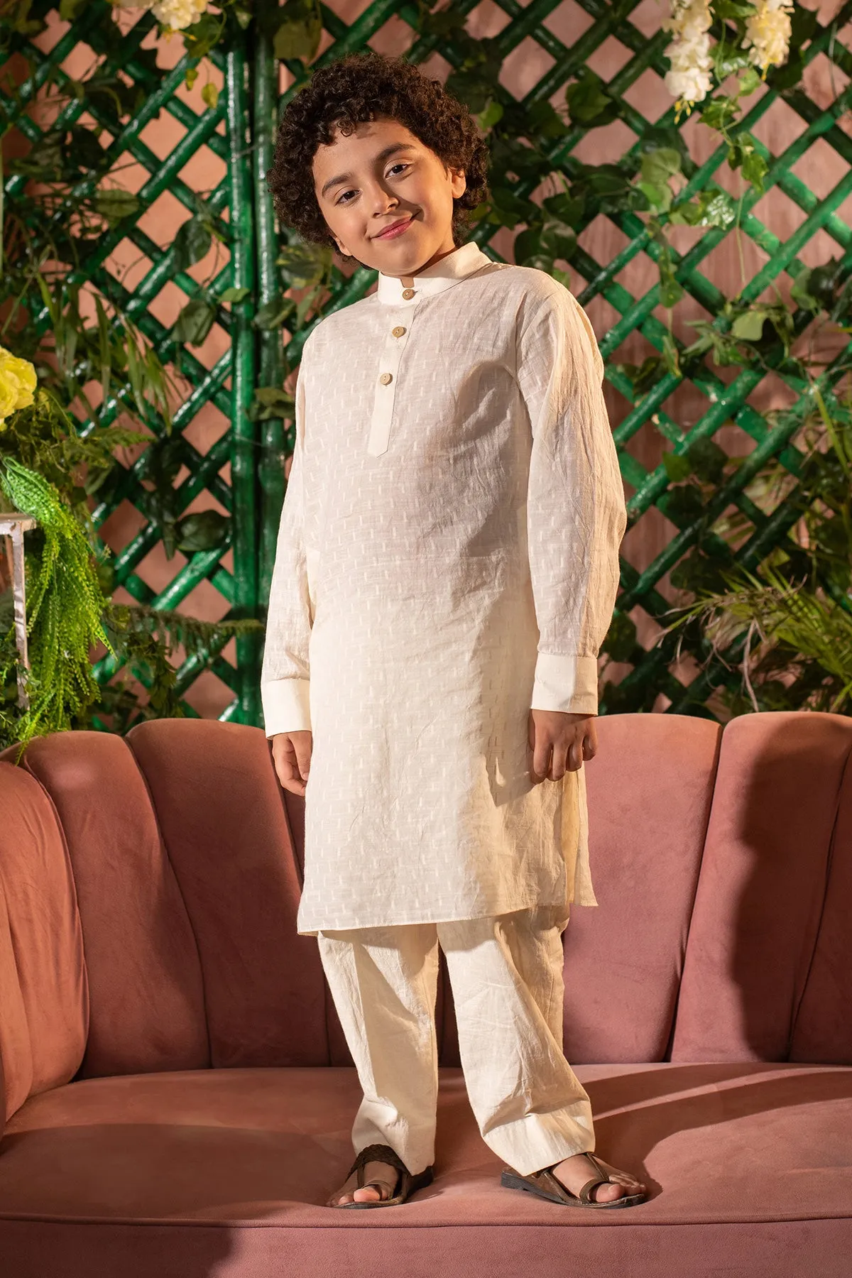 Qanari  -

 Embroidered  

Yellow Nehru Jacket Paired With Cream Kurta & Trouser Set